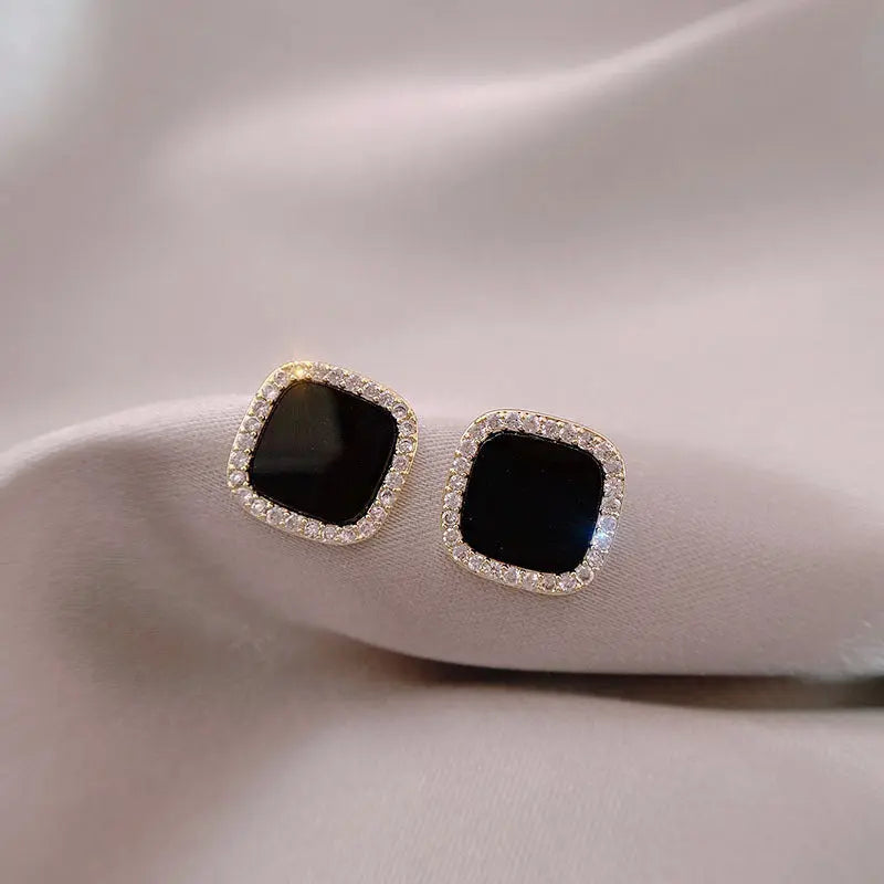 Tidless onyx øreringe med diamanter