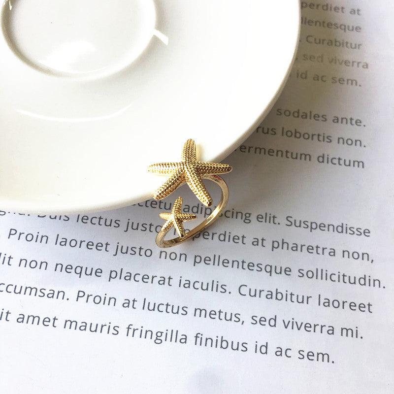 Justerbar Søstjerne Ring i Sølv og Guld