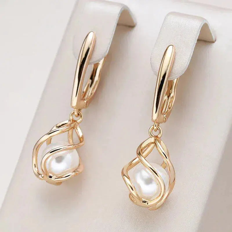 1+1 Tilbud: Elegante Guldperleøreringe + Vintage guld ring med en fancy perle