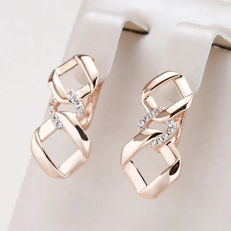 Elegante Knotted Øreringe med Zirkonia i Guld