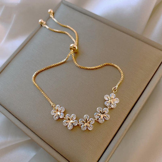 Armbånd Crystal Daisy i Guld