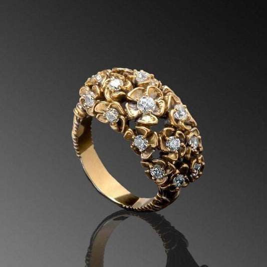 Gylden Skinnende Ring med Blomster