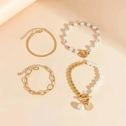 Sæt de Chic Armbånd på 4 Stykker - Slange, Perler og Led | Guld
