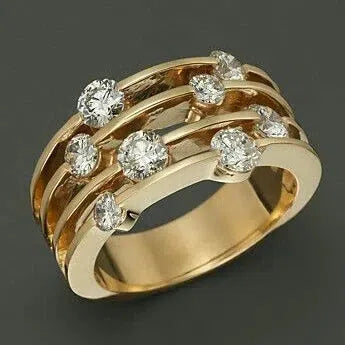 Gylden lagdelt ring med zirconia